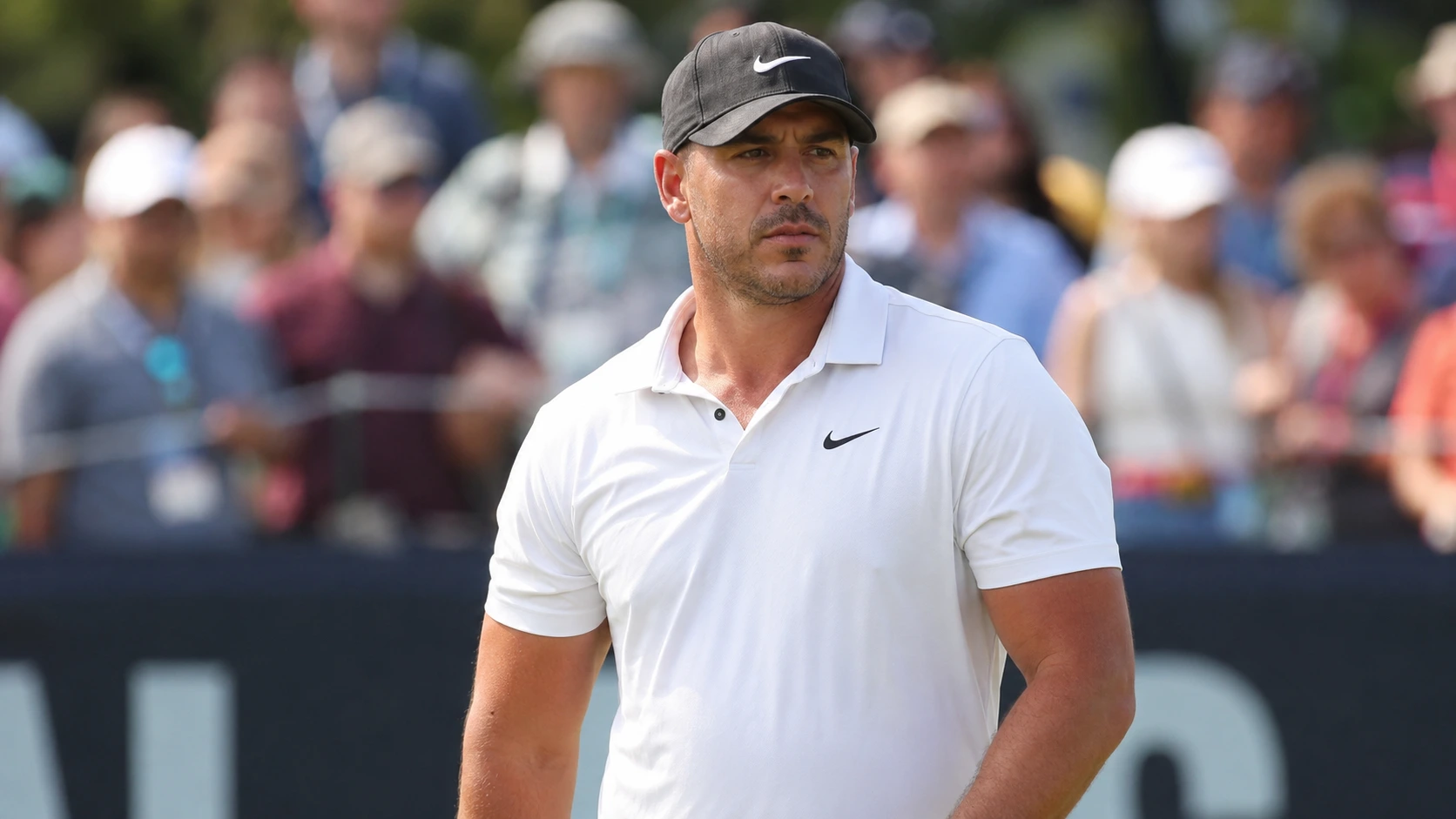 Brooks Koepka looking intense during tournament play, named as the first player for TGL's Motor City Golf Club.