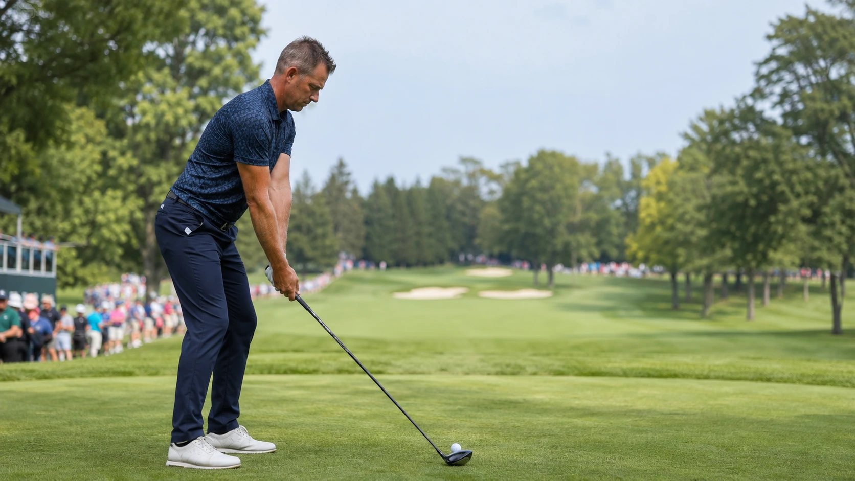 Henrik Stenson preparing to hit a tee shot at Warwick Hills ahead of his 2026 PGA Tour Champions debut at The Ally Challenge.