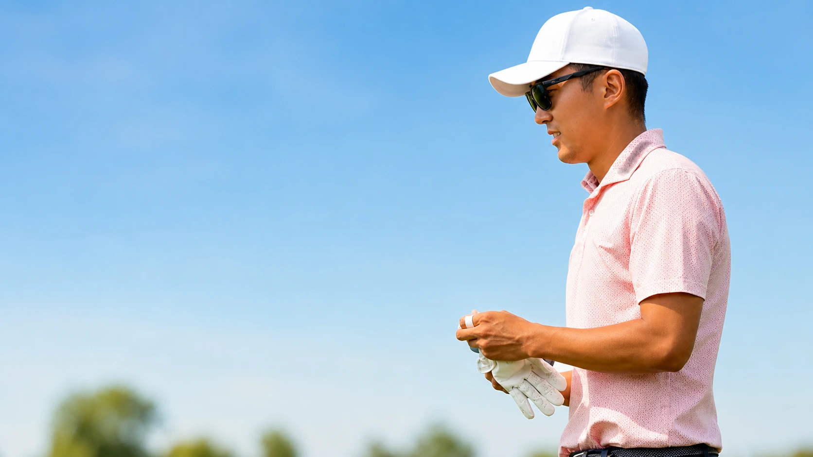 Michael Kim hitting an approach shot on the 18th hole at TPC Twin Cities.